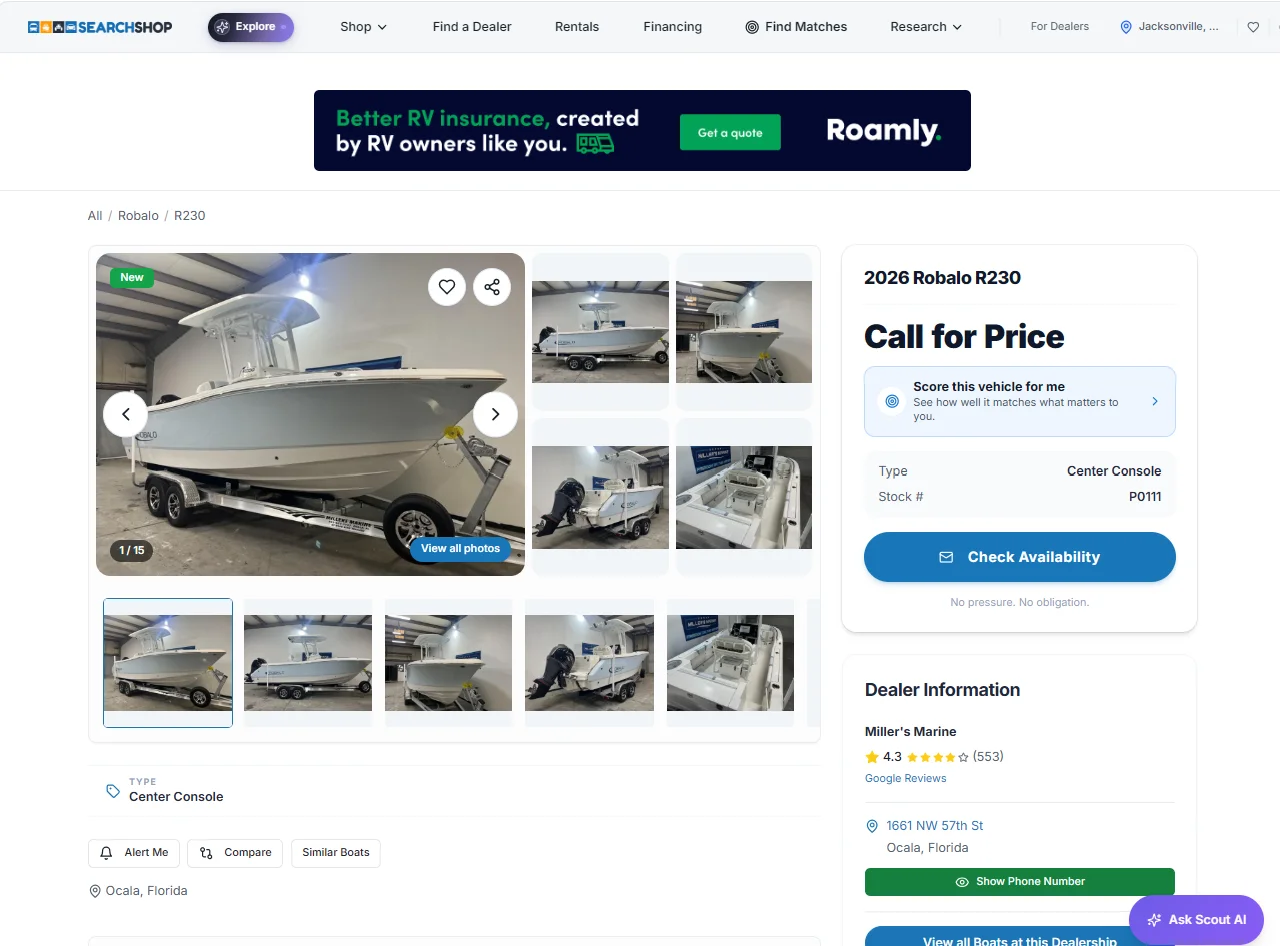 Real Searchshop vehicle detail page with a Roamly masthead ad above a 2026 Robalo R230 boat listing.